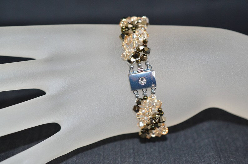 Crystal bracelet, cuff, crystal metallic gold 2x, crystal golden shadow