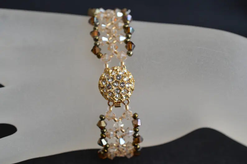 Crystal bracelet, golden shadow, bronze ab2x, rhinestone clasp