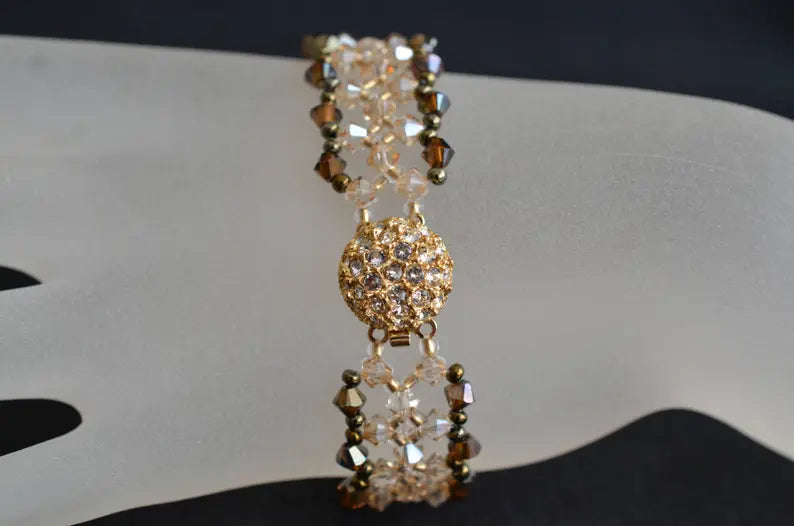 Crystal bracelet, golden shadow, bronze ab2x, rhinestone clasp